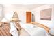Bedroom with wood floors, natural light, and wooden headboard at 3719 W 30Th Ave, Denver, CO 80211