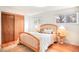 Inviting bedroom with wood floors, bright windows, and warm lighting at 3719 W 30Th Ave, Denver, CO 80211