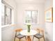Cozy breakfast nook with natural light, a table, and chairs, perfect for morning coffee at 3719 W 30Th Ave, Denver, CO 80211