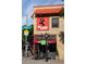 Mondo Vino store exterior featuring a red brick facade and eye-catching signage at 3719 W 30Th Ave, Denver, CO 80211