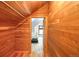Hallway leading into room lined with tongue and groove cedar planks for walls and roof at 3719 W 30Th Ave, Denver, CO 80211