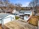 Birds eye view of home featuring a large yard with a deck, patio and detached garage at 10805 Verna Ln, Northglenn, CO 80234