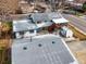 An aerial view of the home showcasing the roof, surrounding yards, and neighborhood at 10805 Verna Ln, Northglenn, CO 80234