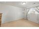 Spacious basement room with carpet flooring and window, ideal for creating a comfortable living space at 10805 Verna Ln, Northglenn, CO 80234