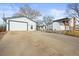 Wide driveway and detached garage offer plenty of parking at 10805 Verna Ln, Northglenn, CO 80234