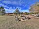 The spacious backyard has a gazebo with outdoor seating and a fire pit at 371 S Estes St # 10, Lakewood, CO 80226