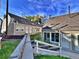 Charming home exterior featuring well-maintained lawns and inviting entrance steps at 371 S Estes St # 10, Lakewood, CO 80226