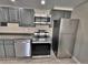 Kitchen featuring stainless steel appliances and tile flooring at 371 S Estes St # 10, Lakewood, CO 80226
