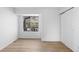 Neutral bedroom featuring a large window providing ample natural light at 1818 S Quebec Way # 2-3, Denver, CO 80231