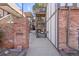A unit in this community has a brick exterior and basement access at 2700 S Holly St # 100, Denver, CO 80222