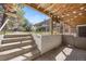 This cozy patio includes an outdoor seating area, garden, and wood ceiling at 2700 S Holly St # 100, Denver, CO 80222