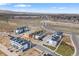 Aerial view showcases new homes under construction with convenient access to highways and amenities at 14412 Pansy Loop, Morrison, CO 80465