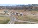 A growing community nestled in a beautiful landscape, featuring modern homes and convenient access to nearby amenities at 14412 Pansy Loop, Morrison, CO 80465