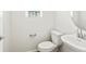 Half bathroom with white fixtures at 14412 Pansy Loop, Morrison, CO 80465
