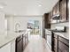 Bright kitchen featuring granite countertops, stainless steel appliances and a view from the back patio at 14412 Pansy Loop, Morrison, CO 80465