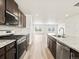 Modern kitchen with stainless steel appliances and granite counters at 14412 Pansy Loop, Morrison, CO 80465