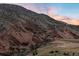 Majestic rock formations create a striking natural landscape, showcasing the iconic Red Rocks at 14412 Pansy Loop, Morrison, CO 80465