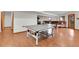 Finished basement with a ping pong table and comfortable seating area at 30382 Marys Dr, Conifer, CO 80433