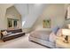 Comfortable bedroom with vaulted ceilings, two windows, and neutral decor at 30382 Marys Dr, Conifer, CO 80433