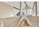 play area in upper floor with play tent and toys and windows with outside views at 30382 Marys Dr, Conifer, CO 80433