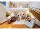 Large living room featuring hardwood floors, open staircase and a loft at 2595 S Adams St, Denver, CO 80210