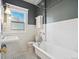 Classic bathroom design with pedestal sink and clawfoot tub at 1444 Fairfax St, Denver, CO 80220