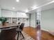 Combination dining area and laundry room area with ample storage cabinets at 1444 Fairfax St, Denver, CO 80220
