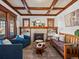 Inviting living room with a cozy fireplace and coffered ceilings at 1444 Fairfax St, Denver, CO 80220