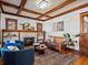 Inviting living room with a cozy fireplace and coffered ceilings at 1444 Fairfax St, Denver, CO 80220
