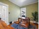 Cozy office featuring hardwood floors and a classic wooden desk at 1444 Fairfax St, Denver, CO 80220