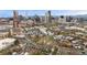 Stunning aerial view of the community featuring the downtown skyline, modern residences, and well-maintained streets at 2222 N Washington St, Denver, CO 80205