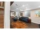 Stylish living room with wood floors, recessed lighting, and comfortable seating arrangement at 2222 N Washington St, Denver, CO 80205