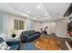 Cozy finished basement living room with modern furniture and recessed lighting at 2222 N Washington St, Denver, CO 80205