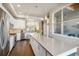 Spacious kitchen with stainless steel appliances, island and open design at 538 S Upham St, Lakewood, CO 80226