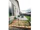 Fenced backyard offers a patio and grass, perfect for outdoor activities and relaxation at 121 S Vandriver Way, Aurora, CO 80018