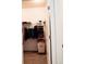 Organized walk-in closet with rods, shelves, and clothes at 121 S Vandriver Way, Aurora, CO 80018