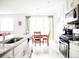 Modern kitchen featuring granite countertops, stainless steel appliances, and ample cabinet space at 121 S Vandriver Way, Aurora, CO 80018