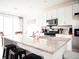 Modern kitchen featuring granite countertops, stainless steel appliances, and ample cabinet space at 121 S Vandriver Way, Aurora, CO 80018