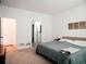 Spacious main bedroom with ensuite bathroom and closet at 121 S Vandriver Way, Aurora, CO 80018