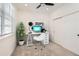 Bright office space featuring a white desk setup, modern decor, and natural light at 6791 Navajo Ct, Denver, CO 80221