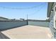 Rooftop deck strung with string lights provides an outdoor entertaining space at 6791 Navajo Ct, Denver, CO 80221