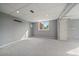 Spacious basement with carpet flooring, recessed lighting, and a large window at 9602 Indian Wells Dr, Lone Tree, CO 80124