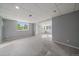Spacious basement with carpet flooring, recessed lighting, and large windows at 9602 Indian Wells Dr, Lone Tree, CO 80124
