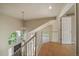 Foyer with hardwood floors and staircase at 9602 Indian Wells Dr, Lone Tree, CO 80124