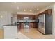Bright kitchen featuring stainless steel appliances and hardwood floors at 9602 Indian Wells Dr, Lone Tree, CO 80124