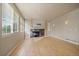 Inviting living space with a modern fireplace and built-in shelving, flooded with light from ample windows at 9602 Indian Wells Dr, Lone Tree, CO 80124
