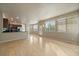 Spacious living room with hardwood floors and lots of natural light at 9602 Indian Wells Dr, Lone Tree, CO 80124