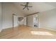 Spacious main bedroom with hardwood floors and ensuite bath at 9602 Indian Wells Dr, Lone Tree, CO 80124
