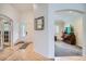 Open foyer showcasing hardwood floors and access to a living area at 1851 S Marshall Cir, Lakewood, CO 80232