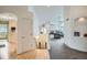 Spacious living room with a fireplace, built-in shelves, and pool table at 1851 S Marshall Cir, Lakewood, CO 80232